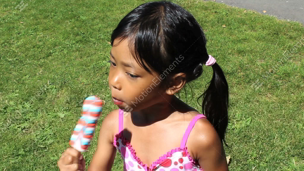 Little Girl Enjoying A Popsicle Stock Video Footage 1381206 Royalty