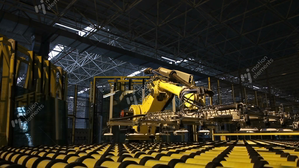 robot crane loads large glass sheet to stack stock video footage large glass sheet