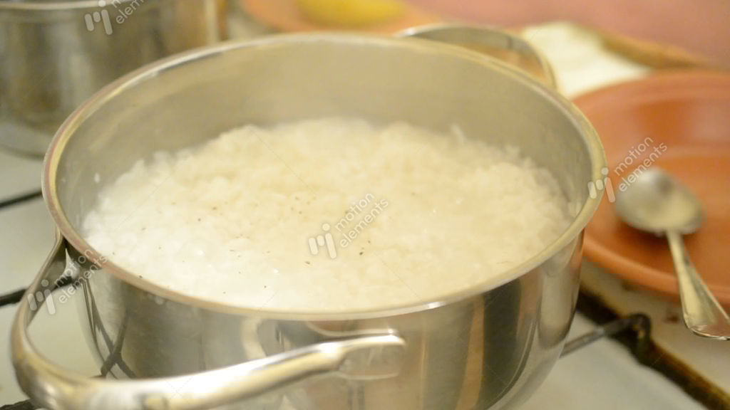 Cooking Rice In Saucepan Stock video footage 10340806