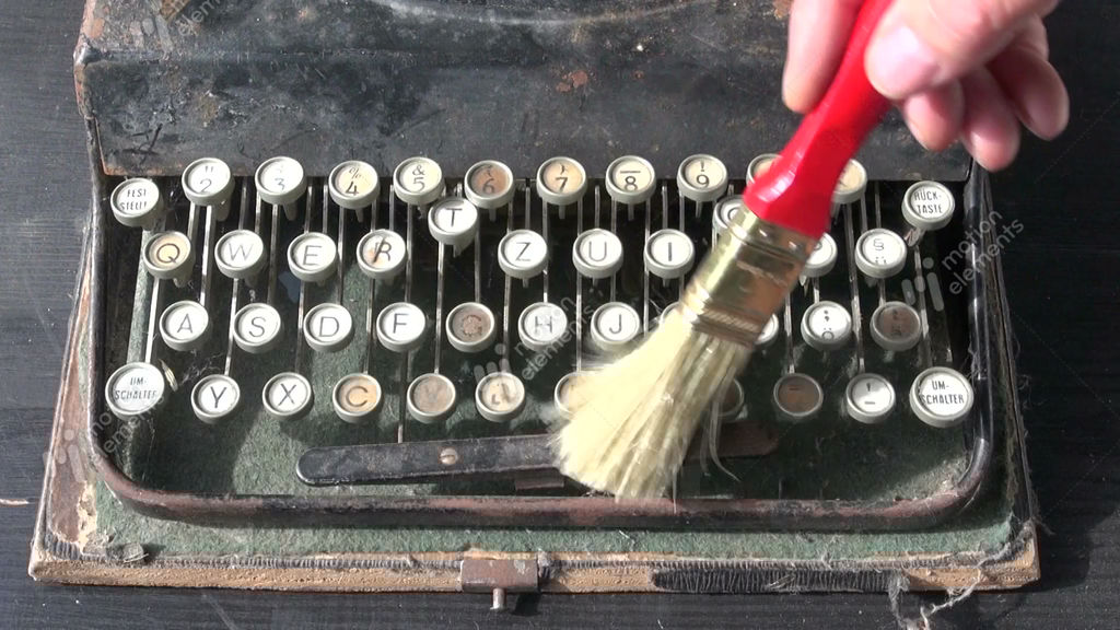 Cleaning Old Typewriter Keyboard Stock video footage 10826471