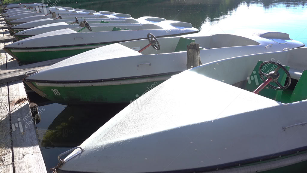 Electric Boats On Morning Lake. UHD Stock video footage 9398780