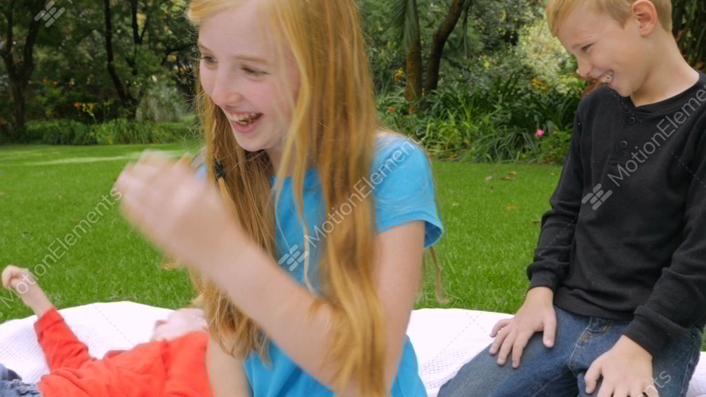 A Younger Brother And Older Sister Wrestle Playfully And Stock Video Footage A Younger Brother And Older Sister Wrestle Playfully And Stock Video Footage