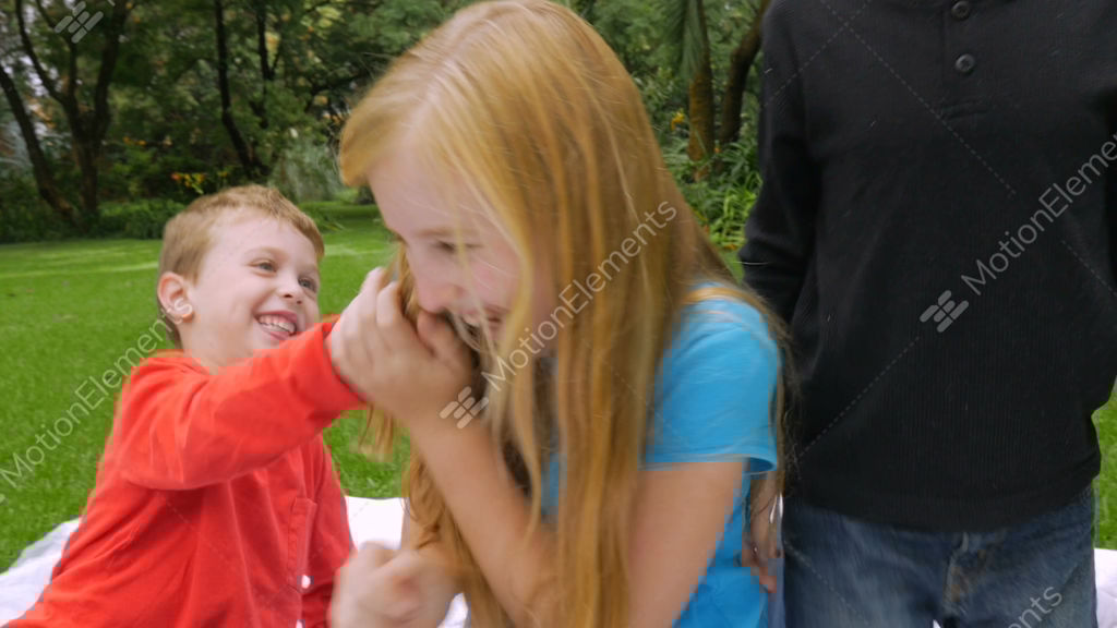 A Younger Brother And Older Sister Wrestle Playfully And Stock Video Footage A Younger Brother And Older Sister Wrestle Playfully And Stock Video Footage