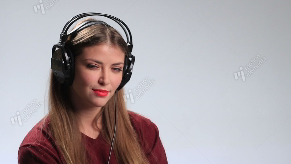 Sexy Woman Wearing Headphones And Listening Music Stock video footage