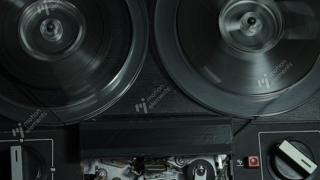 [ungraded] reel-to-reel tape recorder rewinds tape stock video