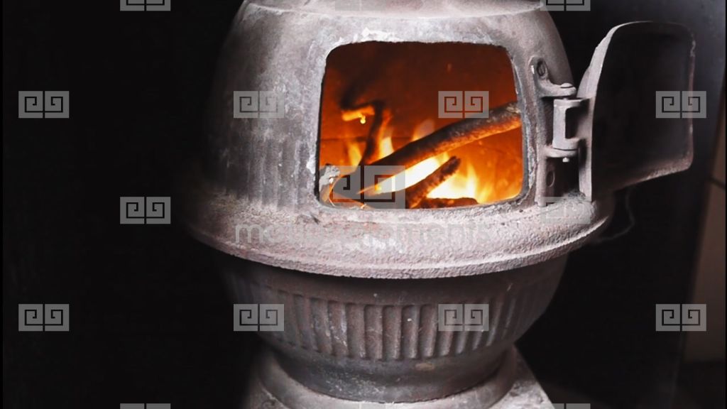 Fire In A Pot Belly Stove Stock video footage 8785669